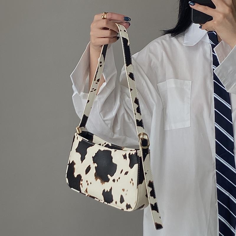 Cow underarm baguette handbag